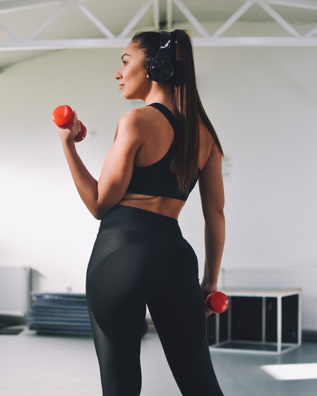 Active woman toning muscles